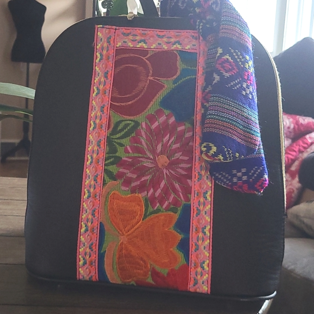 Embroidered leather backpack